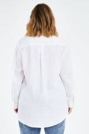 Model Jess wearing size 14 of the Linen Oversized Boyfriend Shirt in colour White (White), from the back