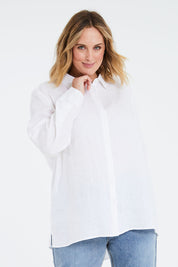 Model Jess wearing size 14 of the Linen Oversized Boyfriend Shirt in colour White (White), from the front, cropped image
