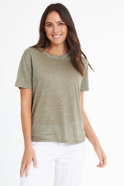 Model Madeline wearing size 10 of the Linen Scoop Neck Top in colour Green (Green), from the front, cropped image