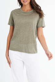 Model Madeline wearing size 10 of the Linen Scoop Neck Top in colour Green (Green), from the front, cropped image