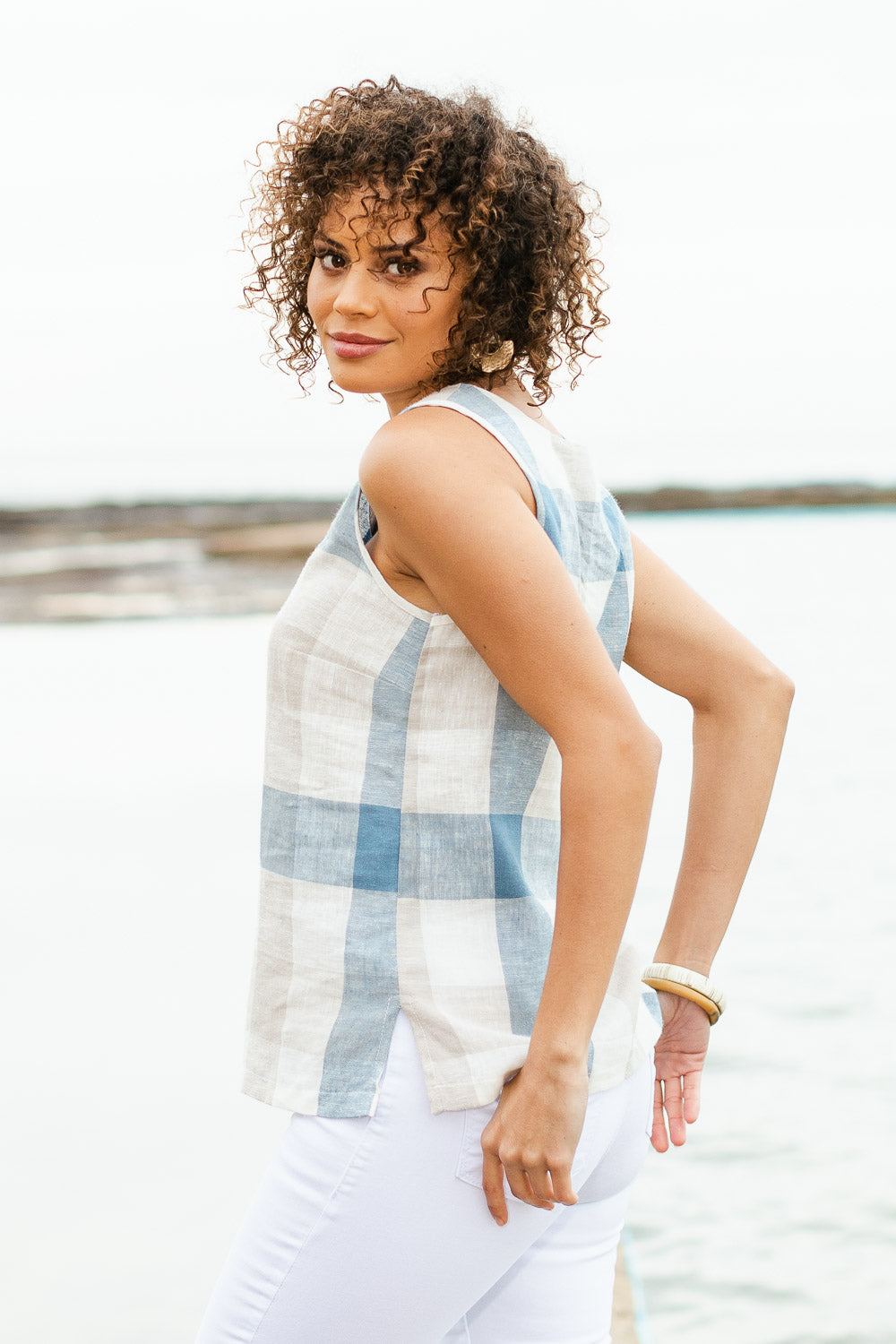 Model Lala wearing size 10 of the Linen Cotton Tank in colour Bluecheck (Blue), from the front, showing the whole outfit