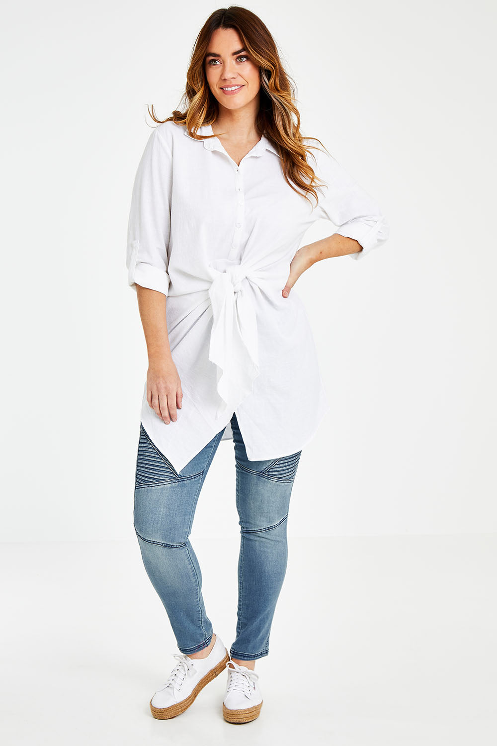 Model Laura wearing size 14 of the Cotton Front Tie Tunic in colour White (White), from the front, showing the whole outfit