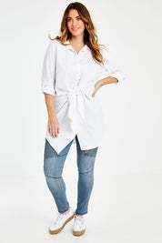 Model Laura wearing size 14 of the Cotton Front Tie Tunic in colour White (White), from the front, showing the whole outfit