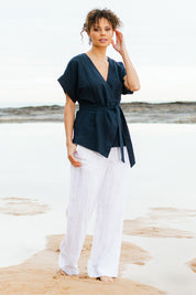 Model Lala wearing size 10 of the Cotton Wide Leg Pant in colour White (White), from the front, showing the whole outfit