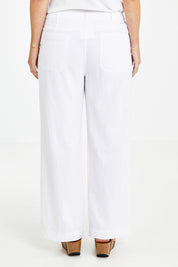 Model Laura wearing size 14 of the Cotton Wide Leg Pant in colour White (White), from the back
