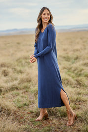 Model Amanda wearing size S of the Cotton Cashmere Wool V Neck Knit Dress in colour Marlin (Blue), from the front, showing the whole outfit