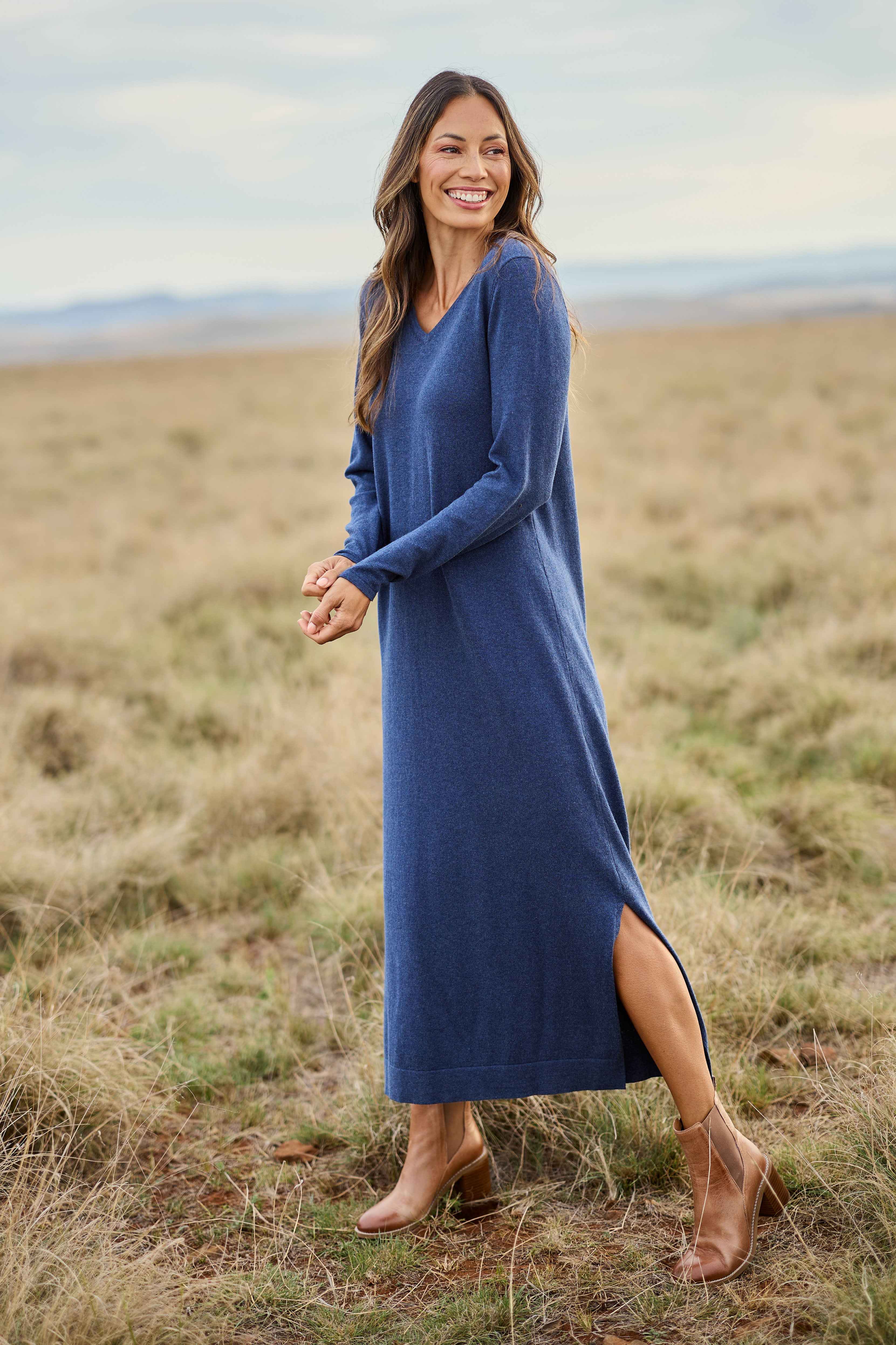 Model Amanda wearing size S of the Cotton Cashmere Wool V Neck Knit Dress in colour Marlin (Blue), from the front, showing the whole outfit