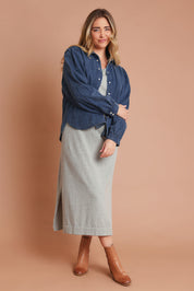 Model Chanel wearing size XL of the Cotton Cashmere Wool V Neck Knit Dress in colour Opalgrey (Grey), from the front, showing the whole outfit