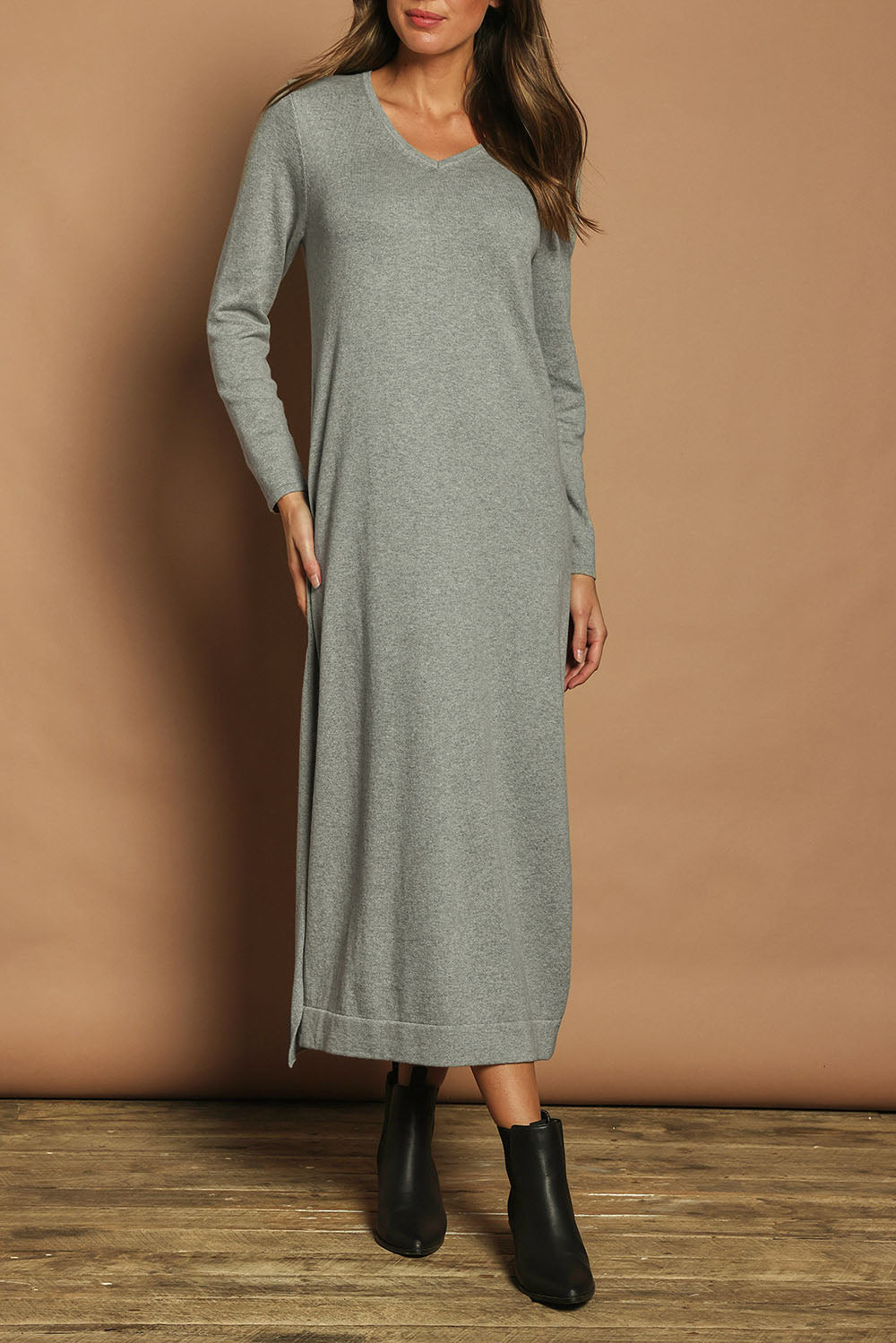 Model Madeline wearing size S of the Cotton Cashmere Wool V Neck Knit Dress in colour Opalgrey (Grey), from the front, cropped image