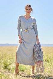 Model Tegan wearing size S of the Cotton Cashmere Wool V Neck Knit Dress in colour Opalgrey (Grey), from the front, showing the whole outfit
