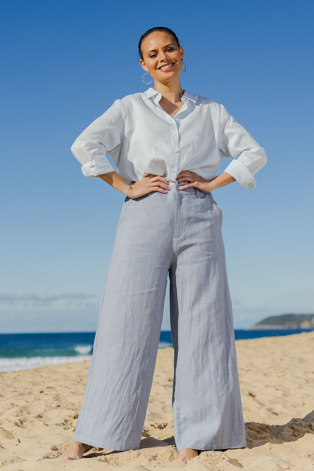 Model Lala wearing size 10 of the Linen Cotton Wide Leg Pant in colour Chambray (Blue), from the front, showing the whole outfit