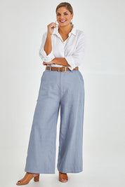Model Monique wearing size 14 of the Linen Cotton Wide Leg Pant in colour Chambray (Blue), from the front, showing the whole outfit