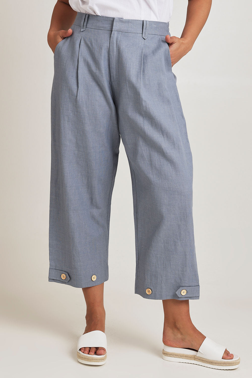 Model Terri-Leigh wearing size 14 of the Linen Cotton 7/8 Pant in colour Chambray (Blue), from the front, cropped image