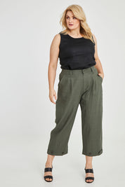 Model Keeara wearing size 16 of the Linen Cotton 7/8 Pant in colour Olive (Green), from the front, showing the whole outfit