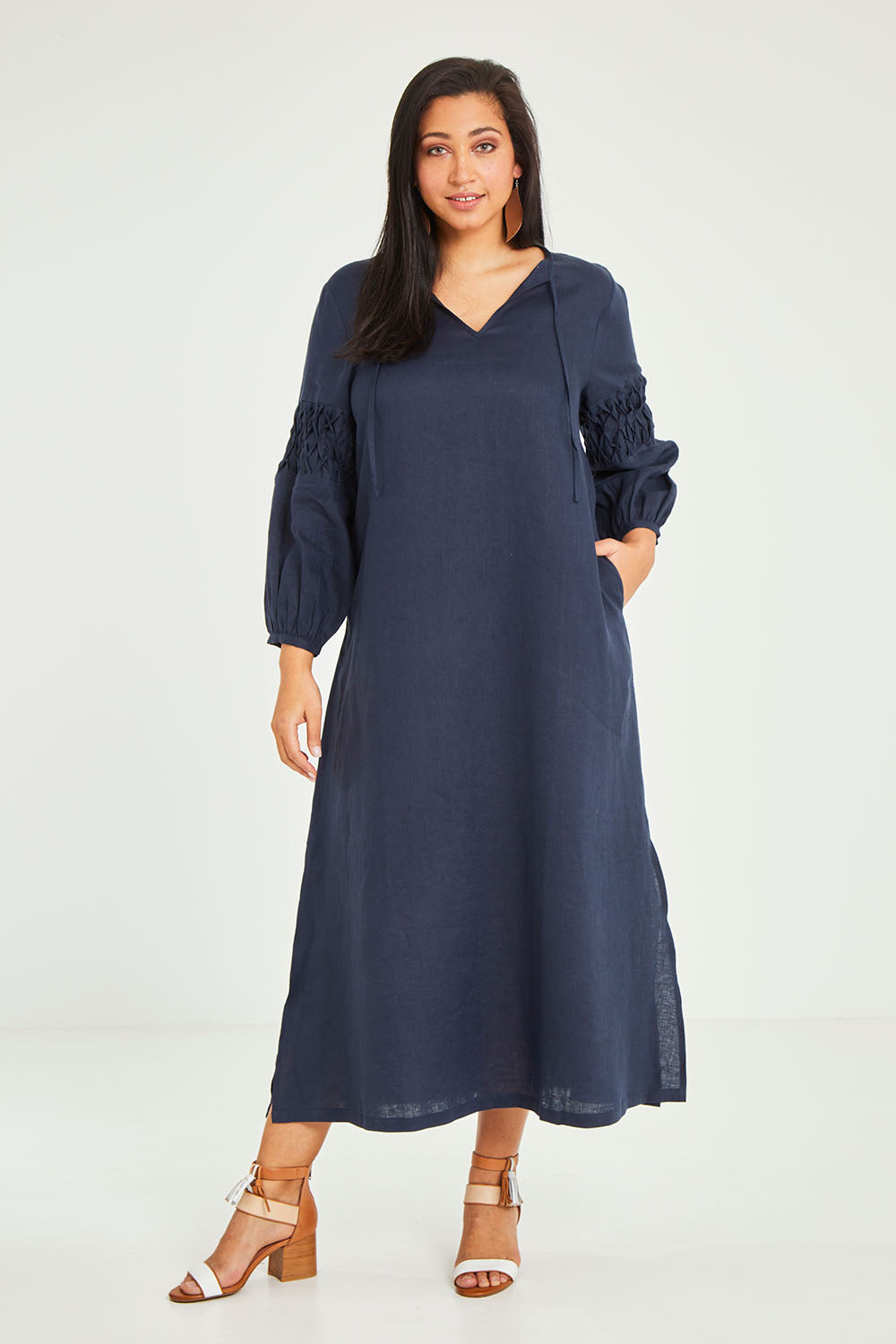 Model Terri-Leigh wearing size 14 of the Linen Honeycomb Sleeve Dress in colour Navy (Blue), from the front, showing the whole outfit