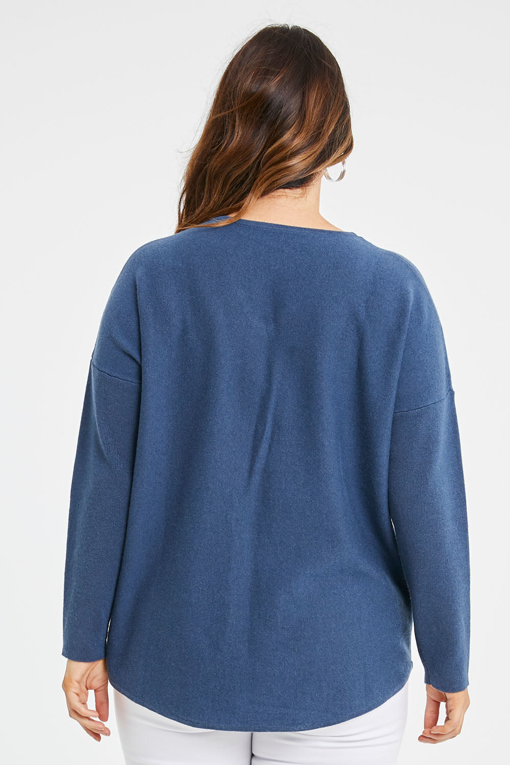 Model Laura wearing size S of the Wool Cashmere Sweater in colour Denim (Blue), from the back
