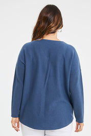 Model Laura wearing size S of the Wool Cashmere Sweater in colour Denim (Blue), from the back