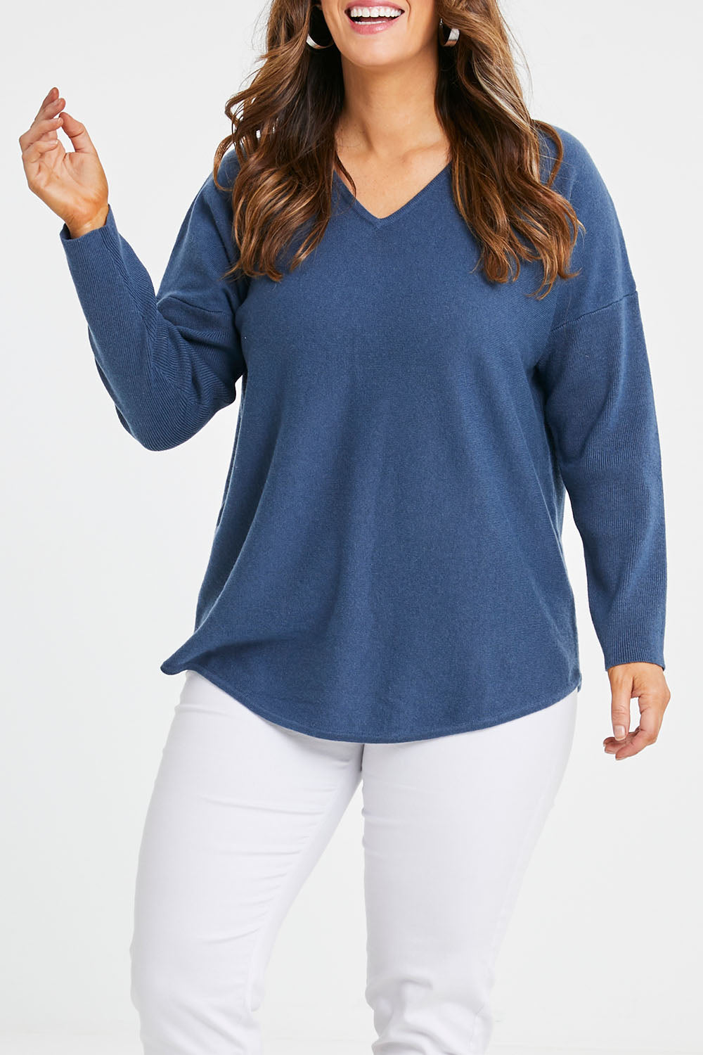 Model Laura wearing size S of the Wool Cashmere Sweater in colour Denim (Blue), from the front, cropped image