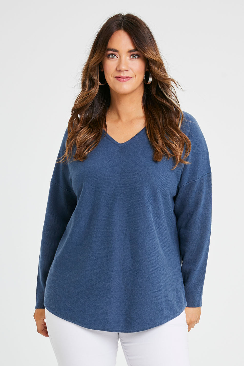 Model Laura wearing size S of the Wool Cashmere Sweater in colour Denim (Blue), from the front, cropped image