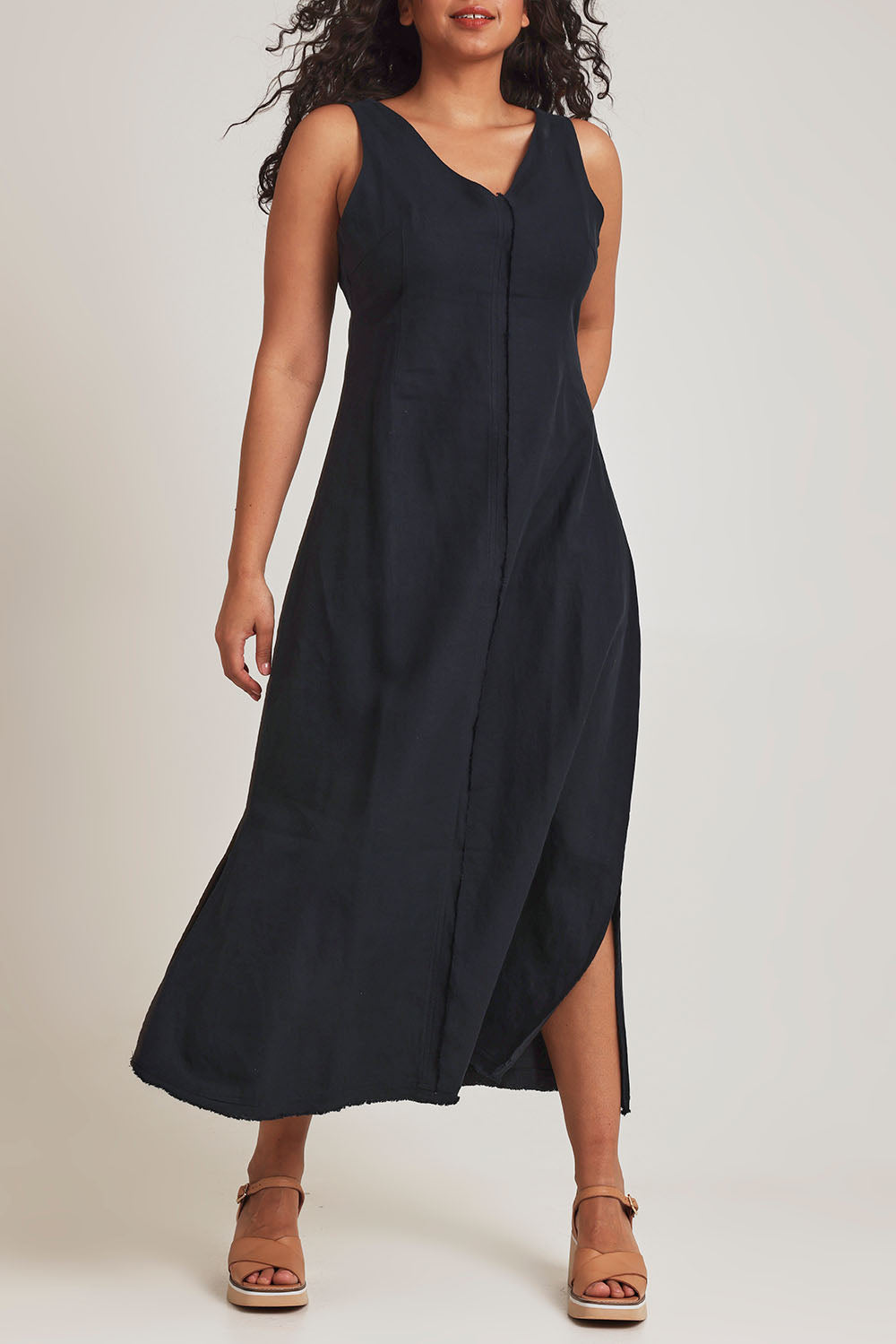 Model Terri-Leigh wearing size 14 of the Linen Cotton Maxi Dress in colour Midnight (Blue), from the front, cropped image