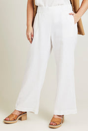 Model Jane wearing size 14 of the Linen Wide Leg Pant in colour White (White), from the front, cropped image