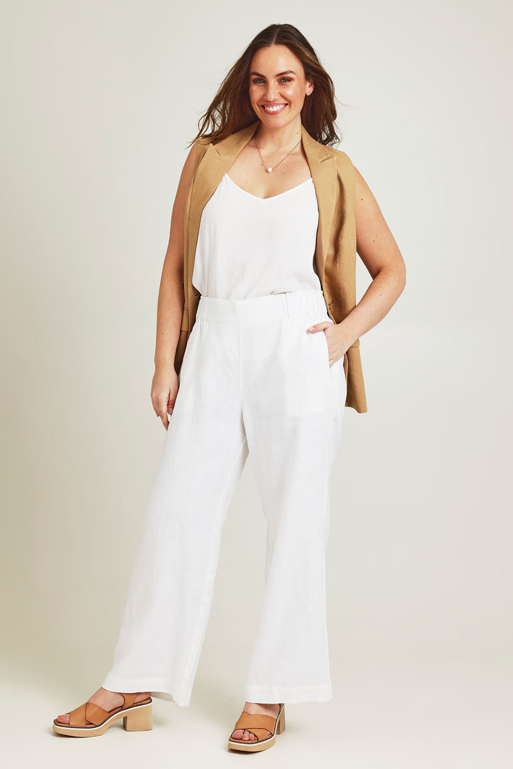 Model Jane wearing size 14 of the Linen Wide Leg Pant in colour White (White), from the front, showing the whole outfit