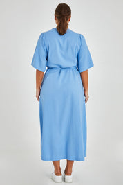 Model Monique wearing size 14 of the Linen Cotton Blend Short Sleeve Wrap Dress in colour Lightblue (Blue), from the back