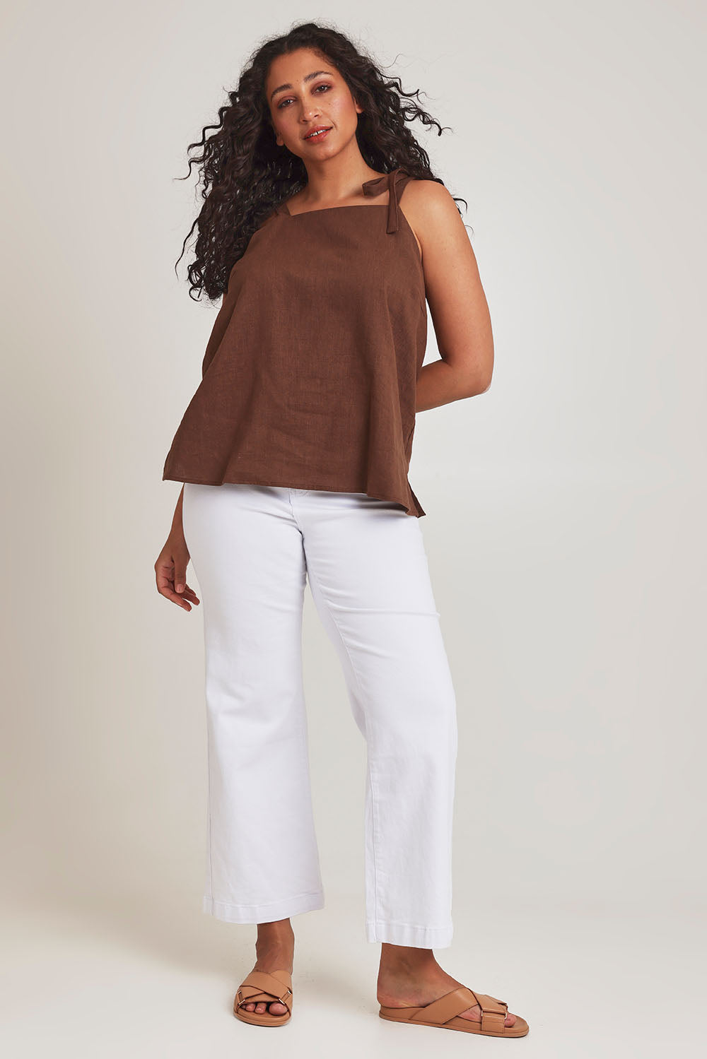 Model Terri-Leigh wearing size 14 of the Linen Cotton Tie Top in colour Chocolate, from the front, showing the whole outfit