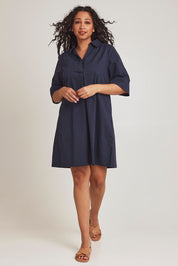 Model Terri-Leigh wearing size 14 of the Cotton Poplin Swing Dress in colour Dustyblue (Blue), from the front, showing the whole outfit