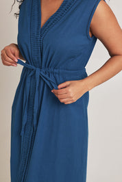 Model Terri-Leigh wearing size 14 of the Cotton Pleat Detail Dress in colour Blue (Blue), from the front, cropped image