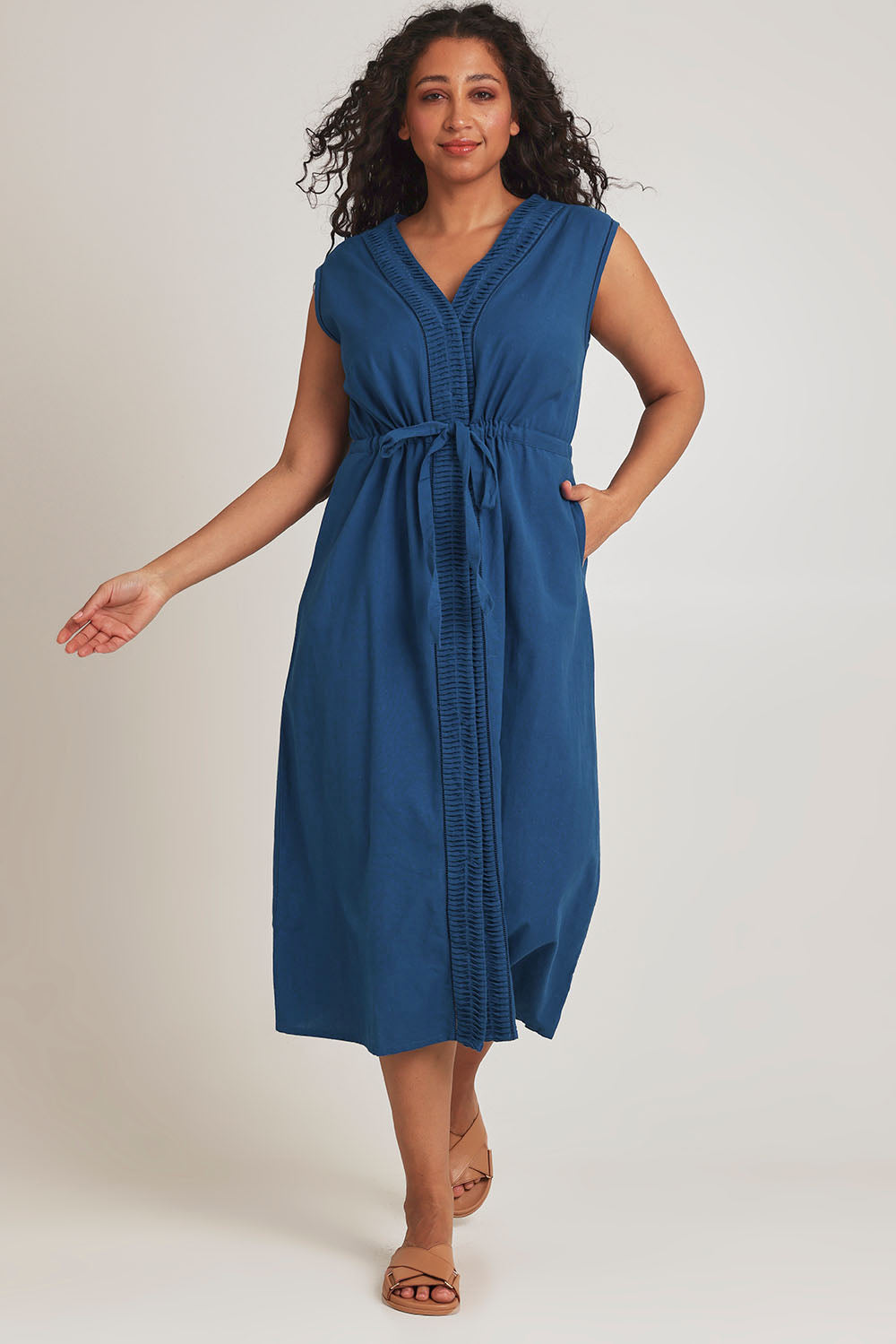 Model Terri-Leigh wearing size 14 of the Cotton Pleat Detail Dress in colour Blue (Blue), from the front, showing the whole outfit