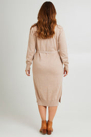 Model Laura wearing size L of the Cotton Cashmere Wool Knit Dress in colour Oatmeal, from the back