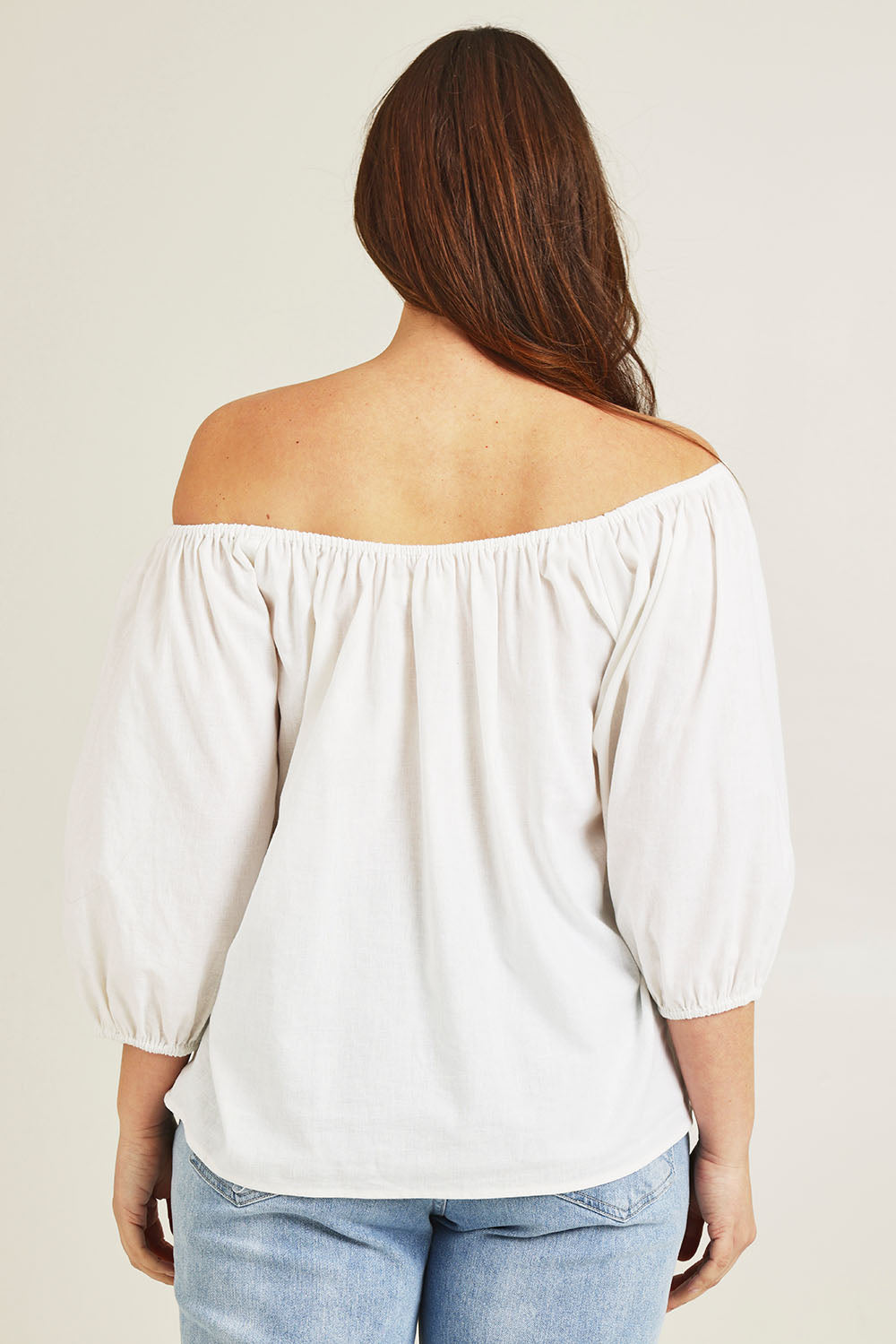 Model Jane wearing size 14 of the Linen Cotton Gathered Neckline Blouse in colour White (White), from the back
