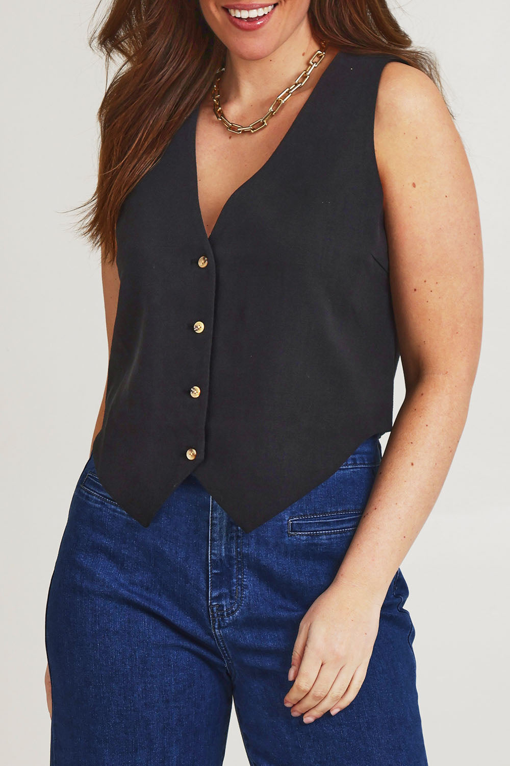 Model Jane wearing size 14 of the Ramie Tencel Vest in colour Black (Black), from the front, cropped image