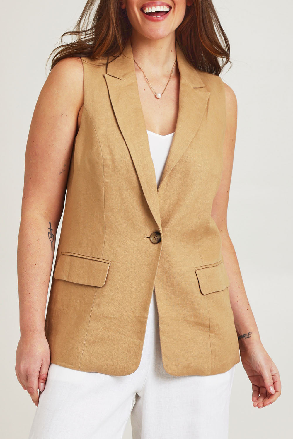 Model Jane wearing size 14 of the Linen Jacket Vest in colour Brownsugar, from the front, cropped image