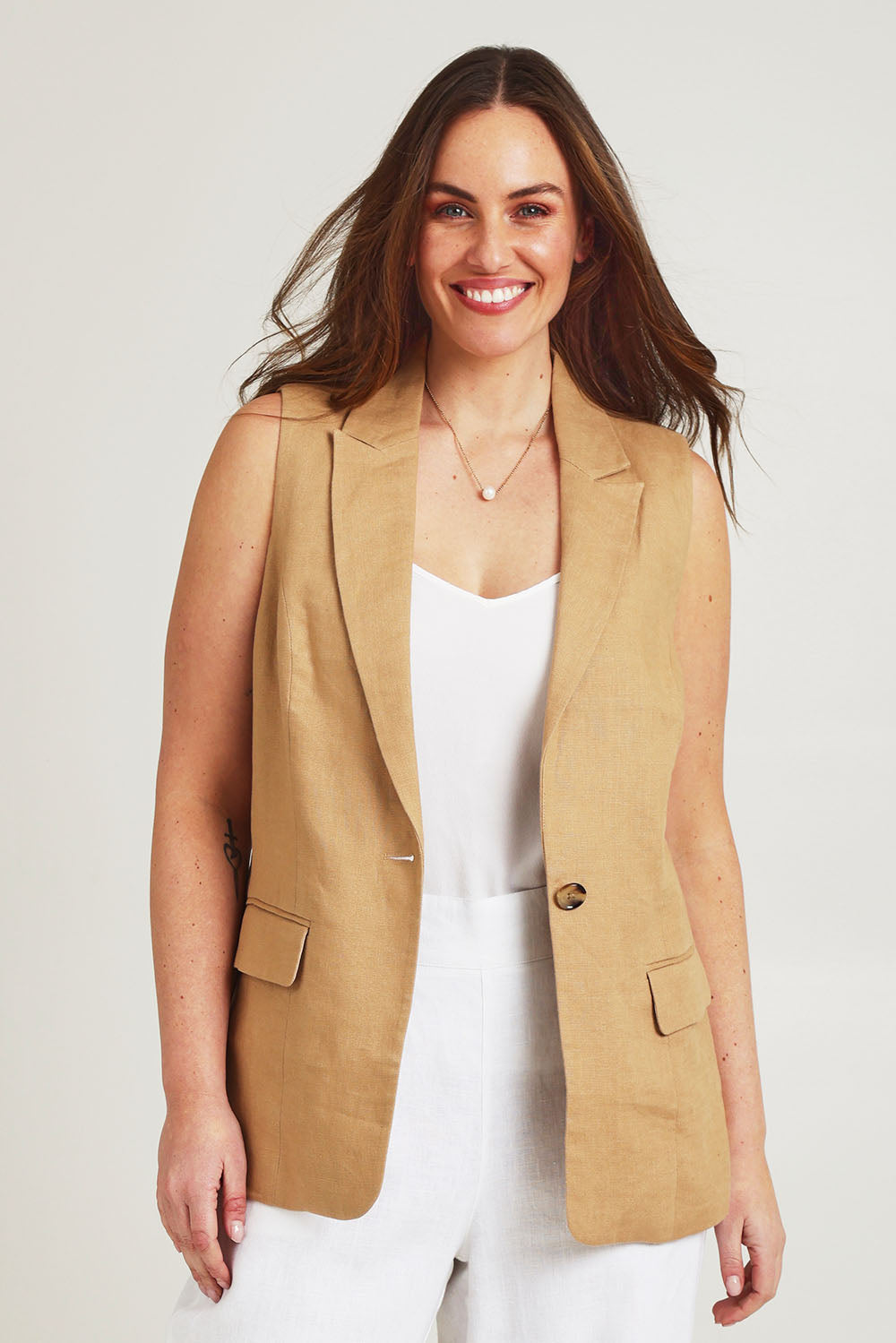 Model Jane wearing size 14 of the Linen Jacket Vest in colour Brownsugar, from the front, cropped image