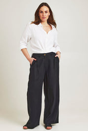 Model Jane wearing size 14 of the Ramie Tencel Straight Pant in colour Black (Black), from the front, showing the whole outfit