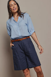 Model Amanda wearing size 10 of the Linen Cotton Long Short in colour Navy (Blue), from the front, cropped image