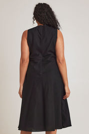 Model Terri-Leigh wearing size 14 of the Linen Cotton Midi Bias Dress in colour Black (Black), from the back