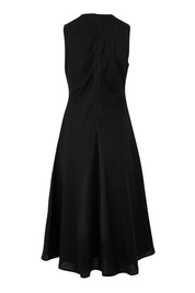 Product shot of the Linen Cotton Midi Bias Dress in colour Black (Black), from the back