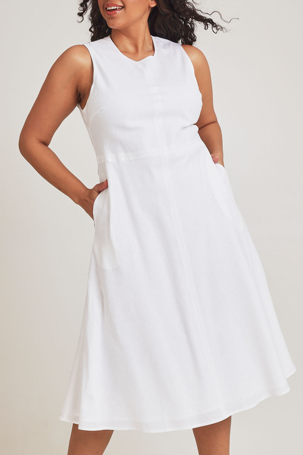 Model Terri-Leigh wearing size 14 of the Linen Cotton Midi Bias Dress in colour White (White), from the front, cropped image