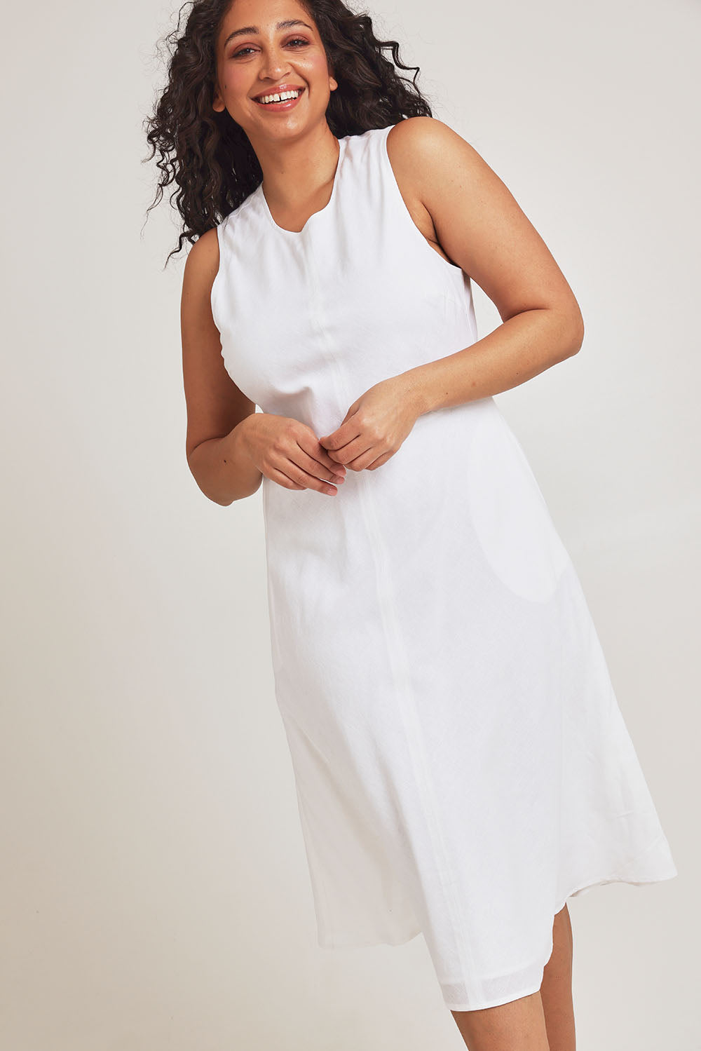 Model Terri-Leigh wearing size 14 of the Linen Cotton Midi Bias Dress in colour White (White), from the front, cropped image