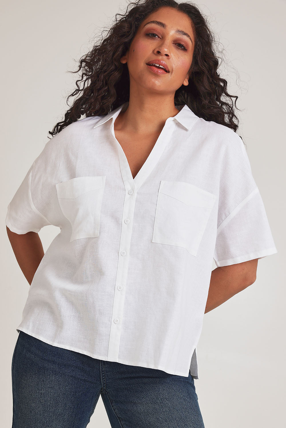 Model Terri-Leigh wearing size 14 of the Linen Cotton Relaxed Shirt in colour White (White), from the front, cropped image