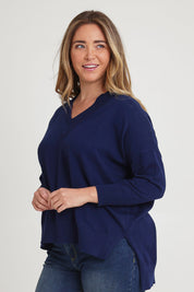 Model Chanel wearing size XL of the Cotton Cashmere V Neck Sweater in colour Navy (Blue), from the front, cropped image