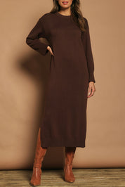 Model Madeline wearing size S of the Cotton Wool Cashmere Jumper Dress in colour Coco, from the front, cropped image