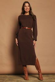 Model Madeline wearing size S of the Cotton Wool Cashmere Jumper Dress in colour Coco, from the front, showing the whole outfit