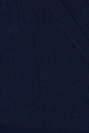 Product shot of the Cotton Cashmere Ribbed Wrap Top – Navy in colour Navy, showing detail