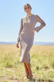 Model Tegan wearing size S of the Cotton Cashmere Boat Neck Dress in colour Timberwolf, from the front, showing the whole outfit