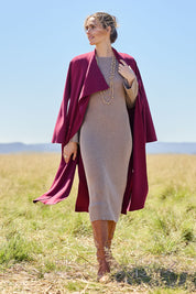 Model Tegan wearing size S of the Cotton Cashmere Boat Neck Dress in colour Timberwolf, from the front, showing the whole outfit