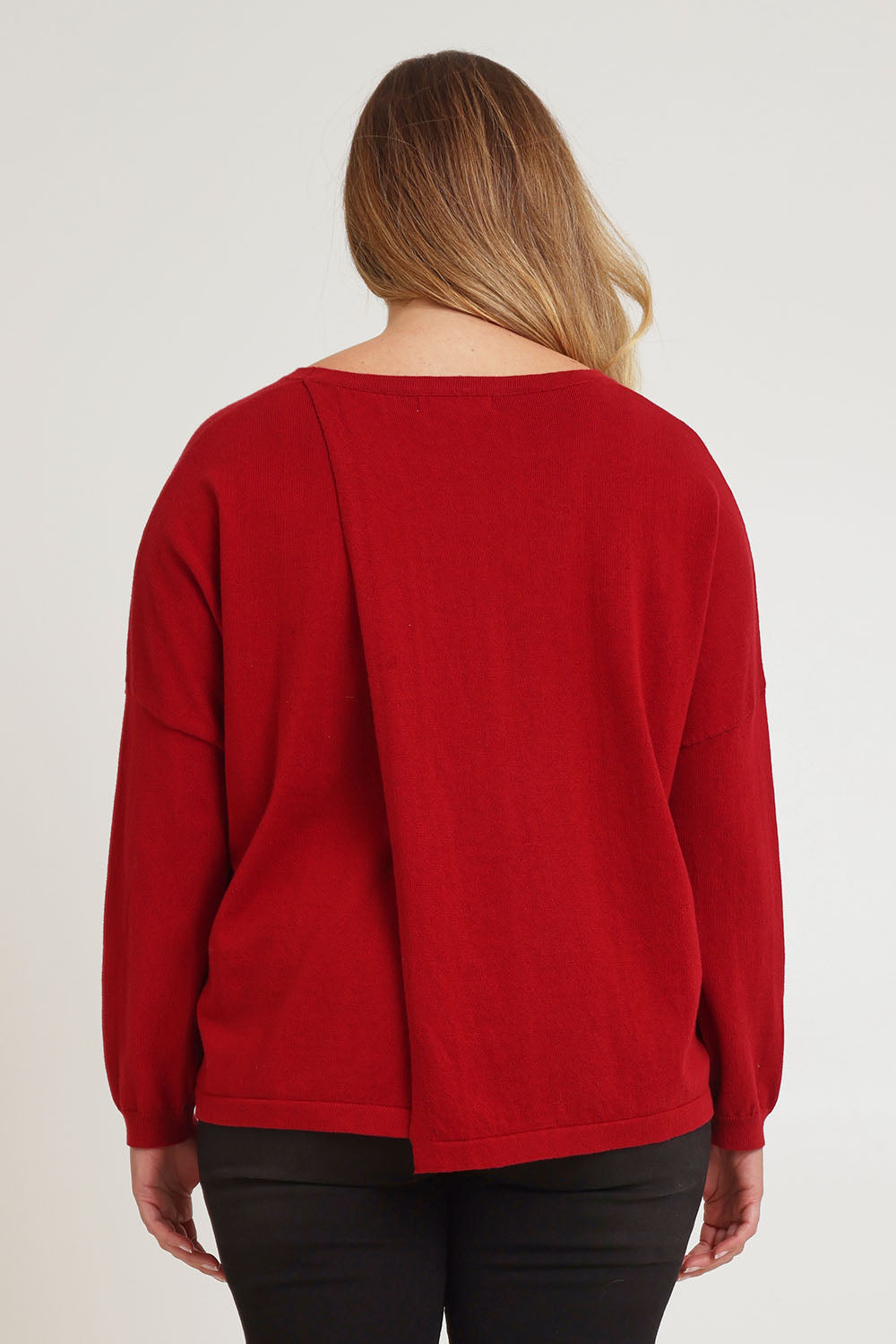 Model Chanel wearing size XL of the Cotton Cashmere Cross Back Sweater in colour Redrust (Red), from the back